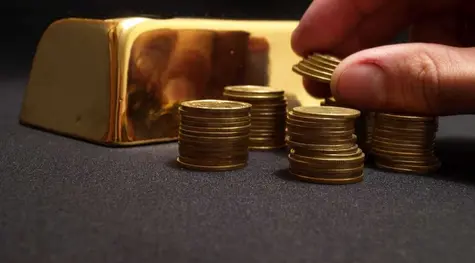 Kurs złota w okolicach 1840 dolarów (USD) za uncję. Czy cena złotego kruszcu zejdzie jeszcze niżej? | FXMAG INWESTOR
