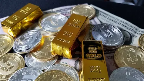 Złoto wróci ponad 5000 USD, srebro niekoniecznie przebije znów 100 USD