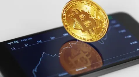 Kurs bitcoina (BTC) oscyluje wokół psychologicznej bariery. Inwestorzy oczekują na więcej wiadomości ze zgłoszeń spot ETF w USA | FXMAG INWESTOR